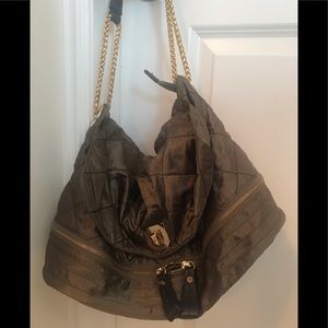 Beautiful JPK army green bag with gold accents.